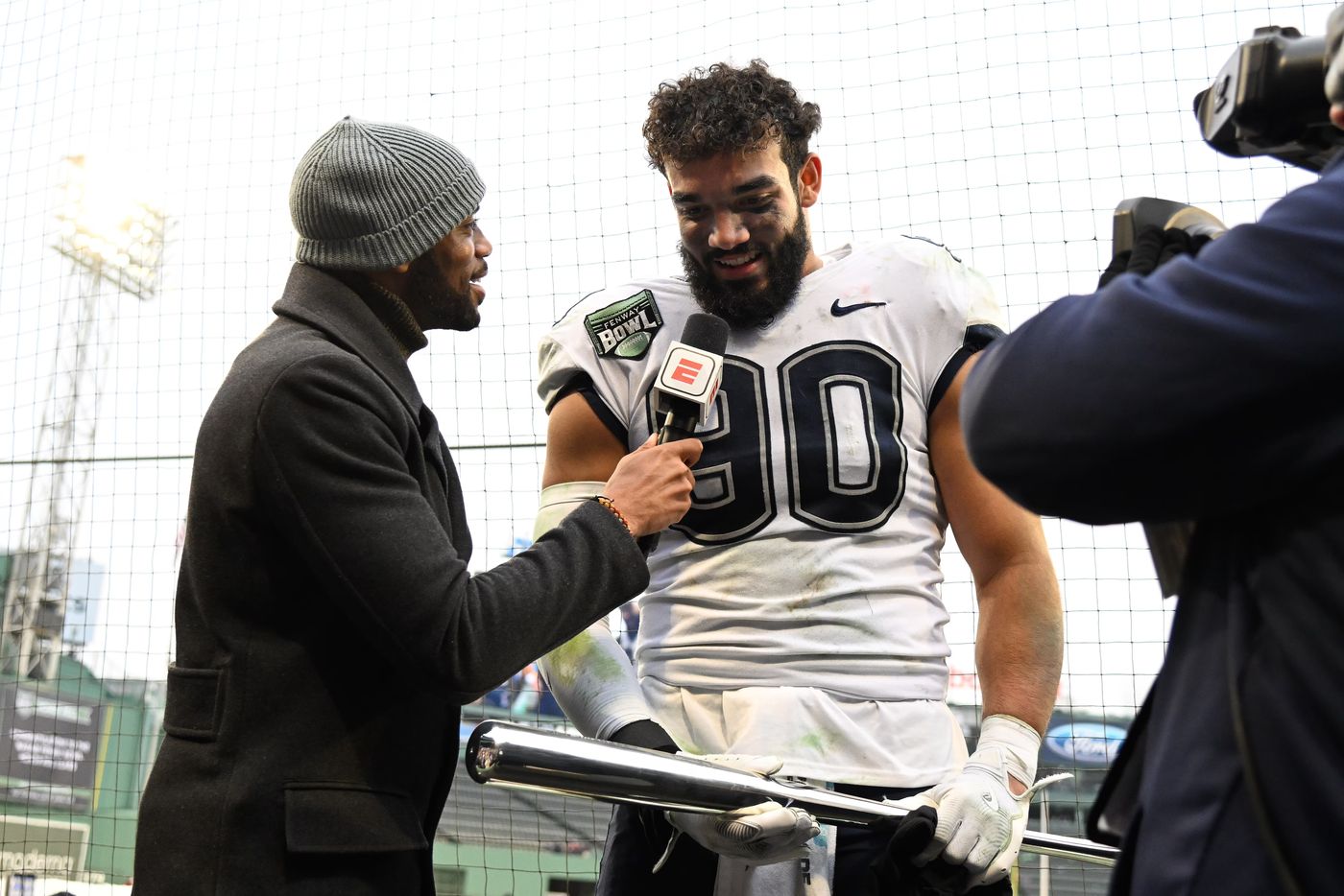 Pryce Yates interviewed on the field after being named Fenway Bowl defensive MVP