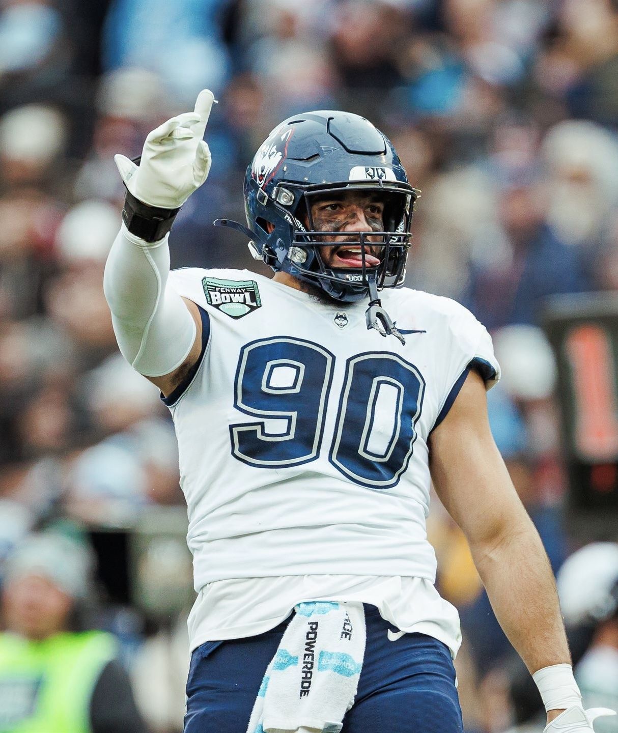 Pryce Yates in UConn's #90 jersey celebrating at the 2024 Fenway Bowl